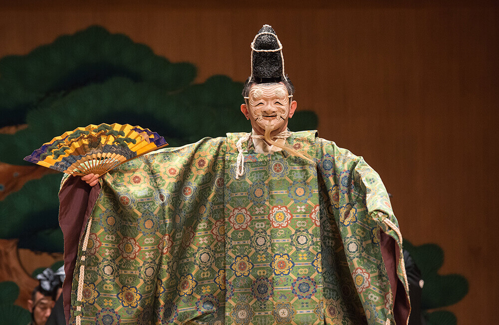 Kiyokazu Kanze (in mask) in <em>Okina</em>, July 13, 2016. Photo by Stephanie Berger.
