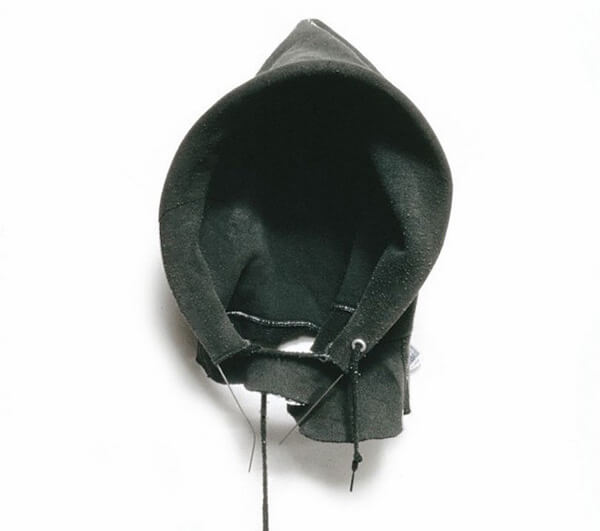 David Hammons, <em>In the Hood</em>, 1993. Athletic sweatshirt hood with wire. 23 x 10 x 5 inches. Image courtesy of the artist and Mnuchin Gallery.